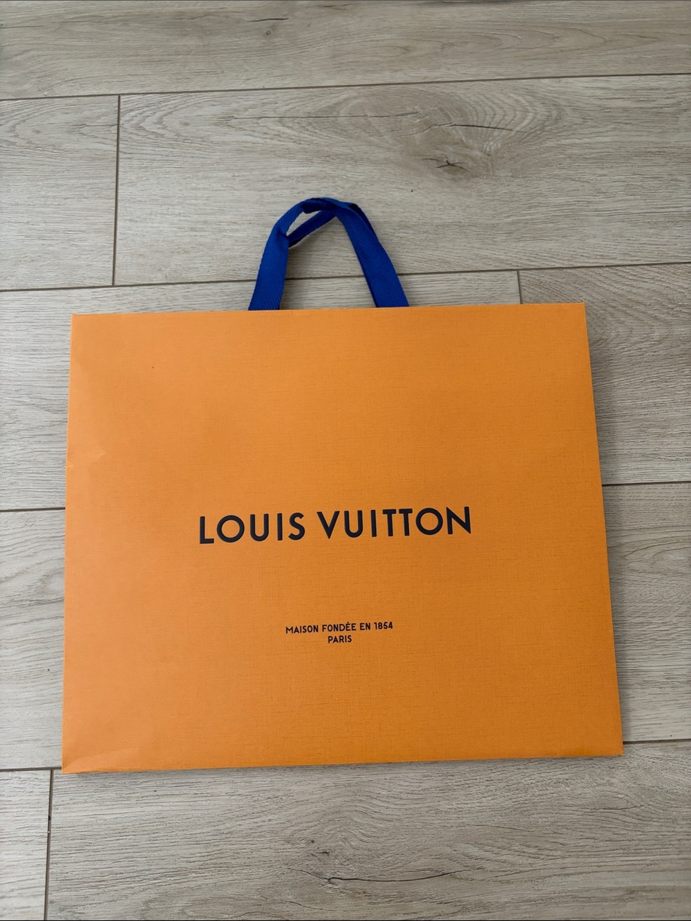 Louis Vuitton Orange Shopping Bag with Blue Ribbon Handles